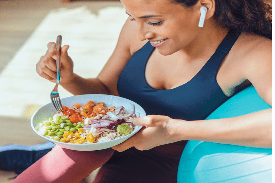 a woman eating well after exercise for menopause support in Australia
