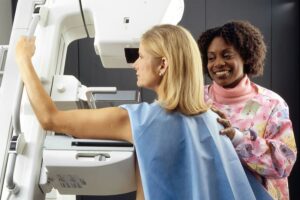 Woman having a mammogram before she has HRT
