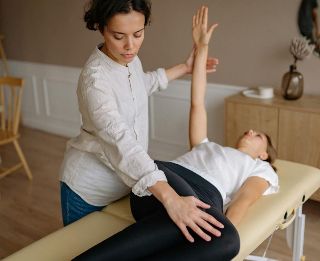 woman getting physio help with her menopause joint pain